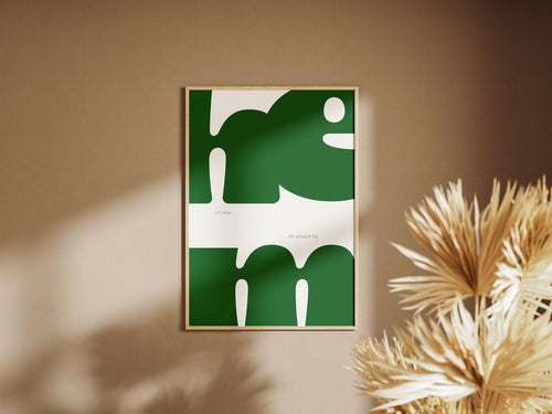 Ett hem att längta till är en hyllning till platsen där allt får landa. Ordet hem är typografiskt uppdraget och har en grön nyans. Bakgrunden är vit. 

Här är postern inramad och uppsatt i ett hem. 