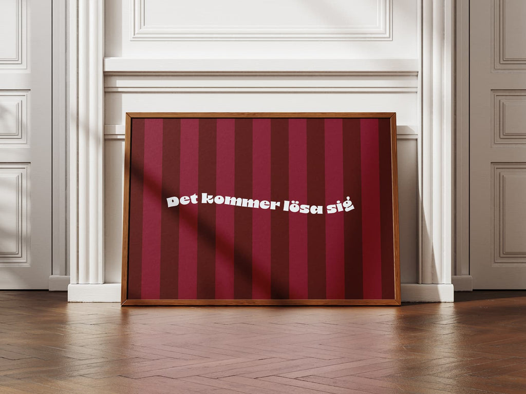 En inramad poster med budskapet "Det kommer lösa sig".